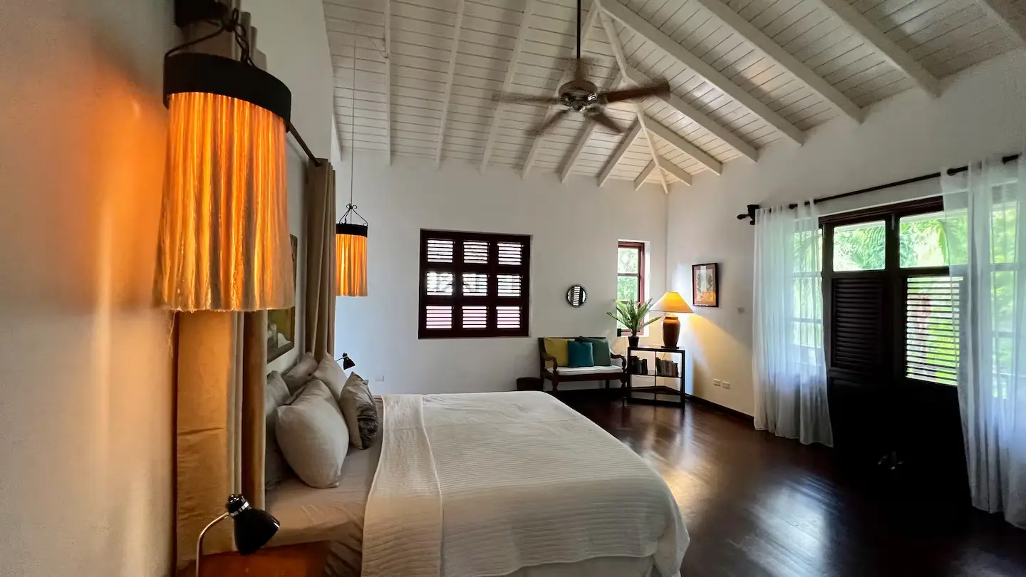 Master suite with king bed, ensuite and tropical views