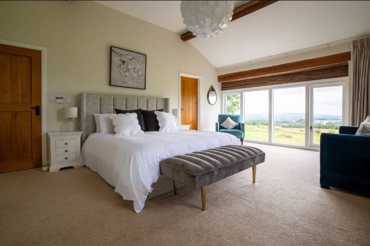 Spacious master suite with stunning countryside views