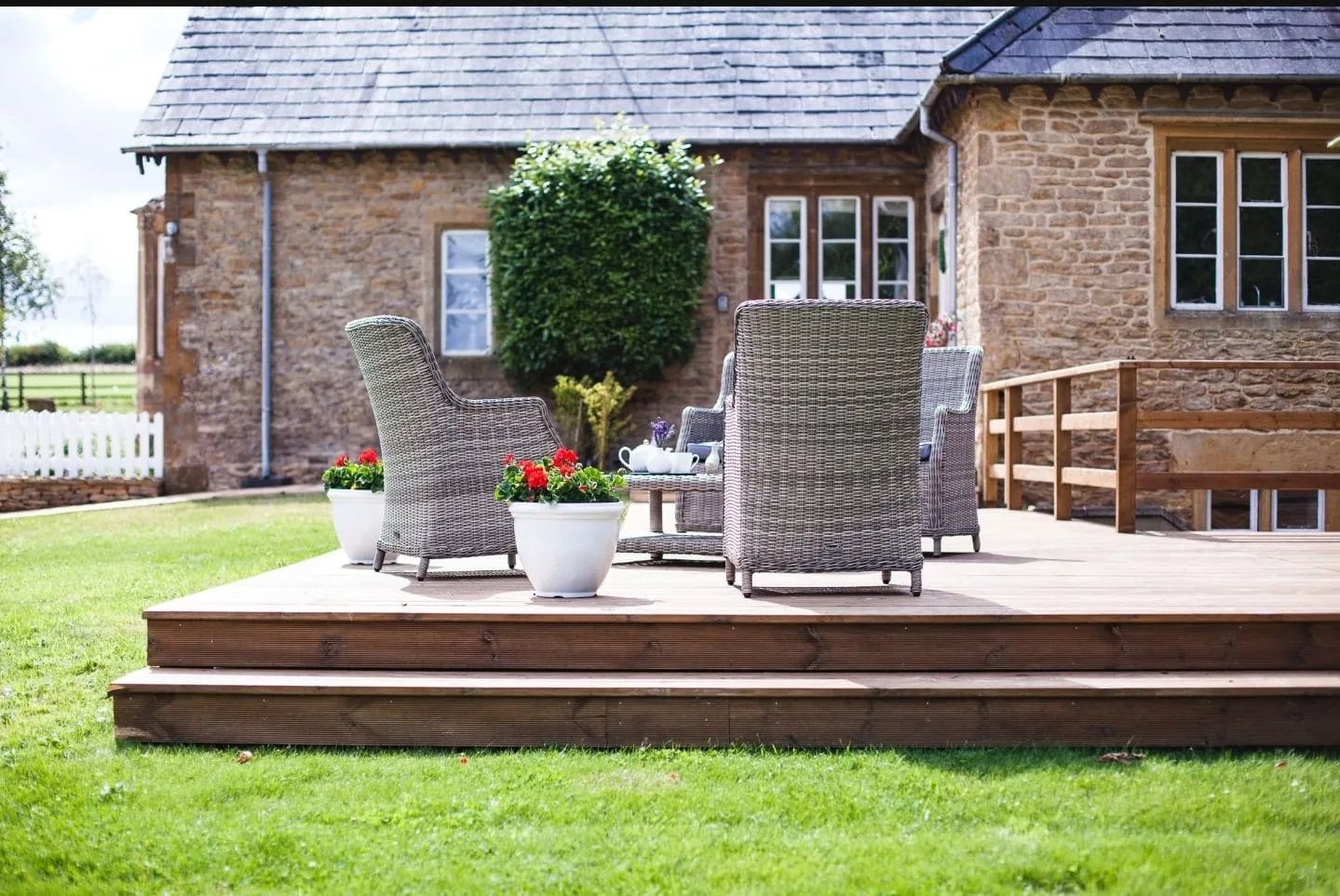 Lavender Cottage's stone exterior and garden terrace