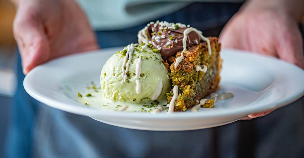 Pistachio and almond baklava tart with pistachio ice cream at Bristol Lido