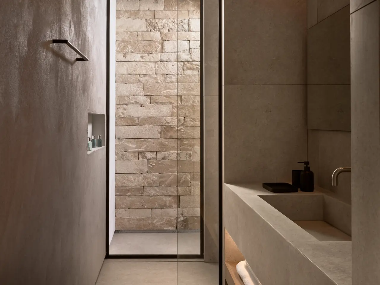 A stone-lined ensuite bathroom
