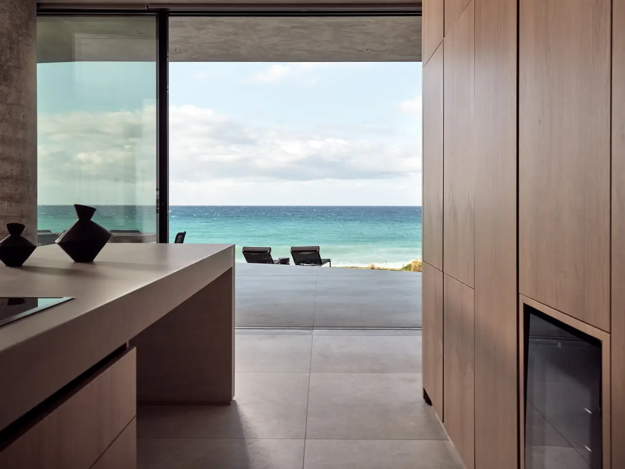The kitchen opening out to the terrace and sea