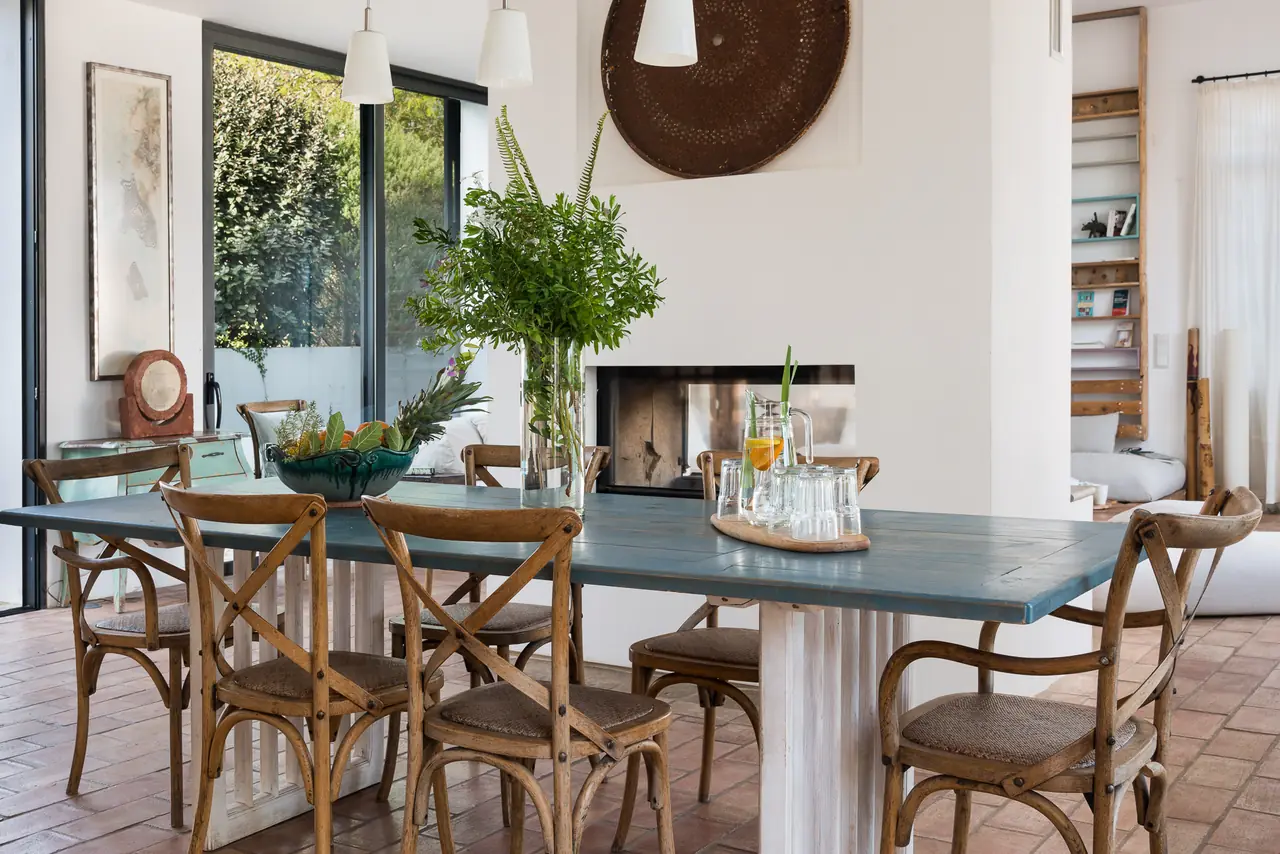 The long dining table in the main house