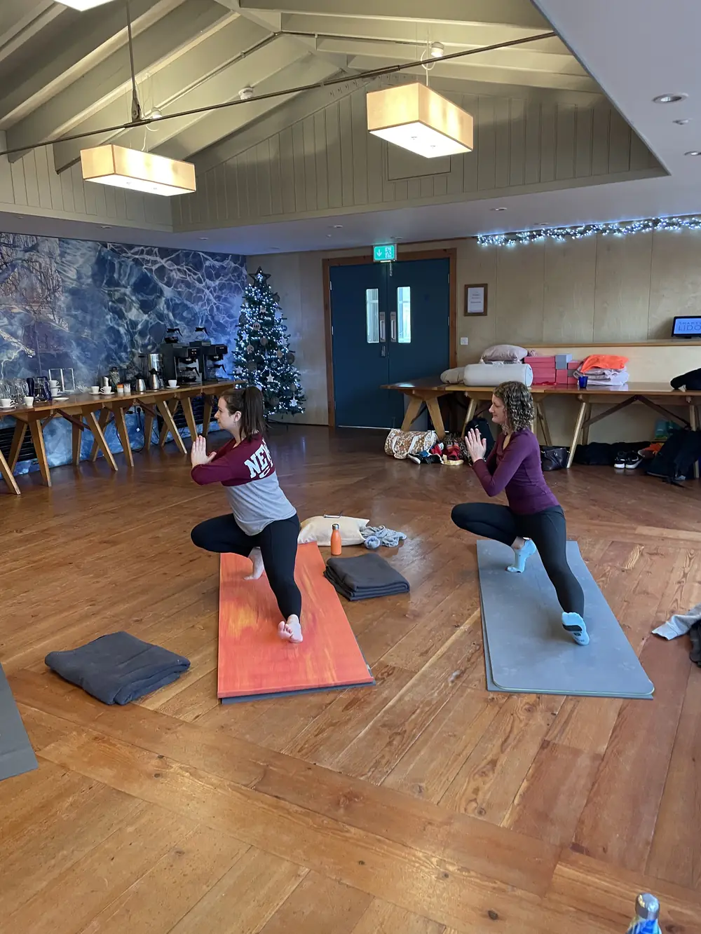 Yoga by the Christmas tree at the Thames Lido retreat day